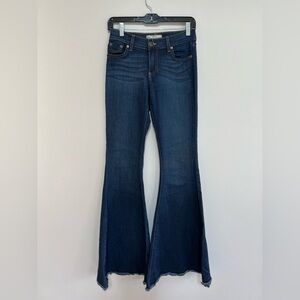 Free People Low-Rise Super Flare Raw Hem Jeans in Medium-Dark Wash, size 27